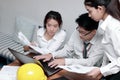 Teamwork and brainstorm concept. Group of Asian business people working with laptop together in modern office Royalty Free Stock Photo