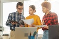 Teamwork brainstorm young professional team concept. Happy multiracial coworkers cooperating working together at office Royalty Free Stock Photo