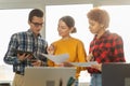 Teamwork brainstorm young professional team concept. Happy multiracial coworkers cooperating working together at office Royalty Free Stock Photo