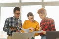 Teamwork brainstorm young professional team concept. Happy multiracial coworkers cooperating working together at office Royalty Free Stock Photo