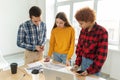 Teamwork brainstorm young professional team concept. Happy multiracial coworkers cooperating working together at office Royalty Free Stock Photo