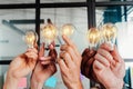 Teamwork and brainstorming concept with businessmen that share an idea with a lamp Royalty Free Stock Photo