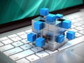 Teamwork business concept - cube assembling from blocks on laptop keyboard. 3d rendering
