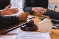 Teamwork of business legal shaking hands meeting after great meeting about Property Law Royalty Free Stock Photo