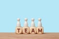 Teamwork and collaboration concept with wooden blocks and figures Royalty Free Stock Photo