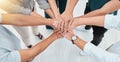 Teamwork, collaboration and motivation business people hands stacked together in office with lens flare. Group hand for