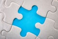 Teamwork, completing the final task and finding the solution concept with pieces of jigsaw puzzle creating a frame or border on Royalty Free Stock Photo