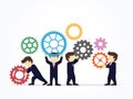 Teamwork concept. Businessmen holding gears