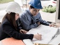 Teamwork concept, Engineer and workers discussing project of new building. ,Team of architects Asian people in group on Royalty Free Stock Photo