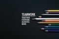 Teamwork concept. group of color pencil on black background with word Teamwork, Together, Everyone, Achieves and More