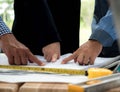 Teamwork Concept, Hands of architect engineer meeting for architectural project. working with partner and blueprint on table Royalty Free Stock Photo