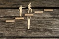 Teamwork concept using cut outs of paper men Royalty Free Stock Photo