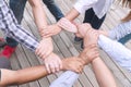 Teamwork connection success concept. people holding hands circle together in the park. Human hands agreement join team Royalty Free Stock Photo