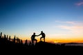 Teamwork couple climbing with helping hand Royalty Free Stock Photo