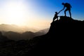 Teamwork couple hiking helping hand Royalty Free Stock Photo