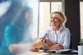 Teamwork creates a positive and productive working environment. two businesswomen having a meeting together in an office