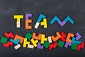 Teamwork creative concept concept jigsaw on the blackboard Royalty Free Stock Photo