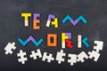 Teamwork creative concept concept jigsaw on the blackboard Royalty Free Stock Photo
