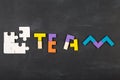 Teamwork creative concept concept jigsaw on the blackboard Royalty Free Stock Photo