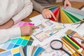 Teamwork of creative designers working with colour palette Royalty Free Stock Photo