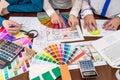 Teamwork of designers choosing colors for rooms Royalty Free Stock Photo