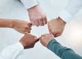 Teamwork, fist bump and hands of business people together for motivation, support and community. Collaboration, team