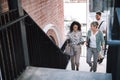 Teamwork fuels forward motion. two businesswomen having a discussion while walking up the stairs in a modern workplace. Royalty Free Stock Photo