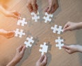 Teamwork idea brainstorming, team partnership connection for problem solving, finding solution in hope concept with puzzle jigsaw Royalty Free Stock Photo