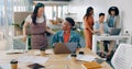 Teamwork, laptop and business people fist bump in office for success celebration. Training, coaching and Asian woman Royalty Free Stock Photo