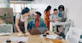 Teamwork, laptop and business people fist bump in office for success celebration. Training, coaching and Asian woman Royalty Free Stock Photo