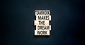 Teamwork makes the dream work symbol. Concept words Teamwork makes the dream work on wooden blocks on a beautiful black table Royalty Free Stock Photo