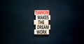 Teamwork makes the dream work symbol. Concept words Teamwork makes the dream work on wooden blocks on a beautiful black table Royalty Free Stock Photo
