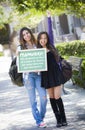 Teamwork Mixed Race Female Students and Chalkboard Royalty Free Stock Photo