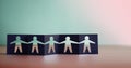 Teamwork Partnership Humanity and Unity Concept. Human Sign Shape cut out on Fold Paper Metaphor