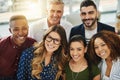 Teamwork, smiling and diverse workers standing together in a creative workplace. Portrait of group of casual Royalty Free Stock Photo