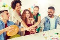 Happy business team at office party holding hands Royalty Free Stock Photo