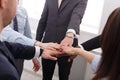 Teamwork and teambuilding concept in office, people connect hand, closeup Royalty Free Stock Photo