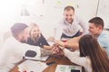 Teamwork and teambuilding concept in office, people connect hand