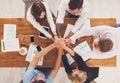 Teamwork and teambuilding concept in office, people connect hands Royalty Free Stock Photo