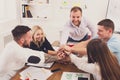 Teamwork and teambuilding concept in office, people connect hands Royalty Free Stock Photo