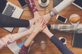 Teamwork and teambuilding concept in office, people connect hands Royalty Free Stock Photo