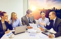 Business team with laptop having discussion Royalty Free Stock Photo