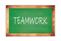 TEAMWORK text written on green school board Royalty Free Stock Photo
