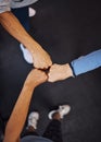Teamwork, top view and senior women fist bump for team building, motivation and unity. Support, collaboration and group Royalty Free Stock Photo