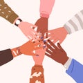 Teamwork, unity and support in community concept. Hands of diverse people group stacking together, top view. Partnership Royalty Free Stock Photo