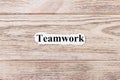 Teamwork of the word on paper. concept. Words of Teamwork on a wooden background Royalty Free Stock Photo