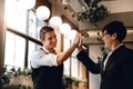 Teamwork or Working Together Concept. Two Businessman making High Five for Greeting. Work Partner Glad for Successful Royalty Free Stock Photo