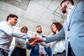 Teamwork. Young business people showing unity with their hands together. Business concept Royalty Free Stock Photo