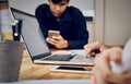 Teamwork, Young businesswoman in office in casual shirt. Selecting information with colleagues with a computer on the table. Royalty Free Stock Photo