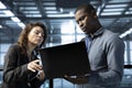 Teamworking employees examining infrastructure in data center